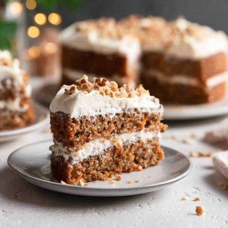 Zucchini Spice Cake with Cream Cheese Frosting and Walnut Garnish Recipe